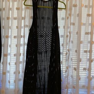 Long sleeveless vest